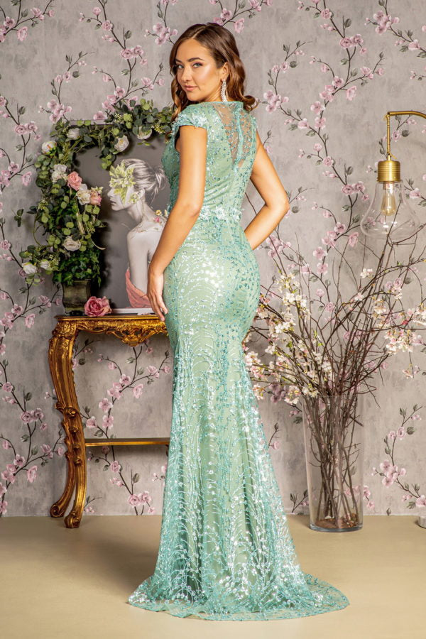 Vestido largo de sirena con flores 3d, brillos y escote transparente